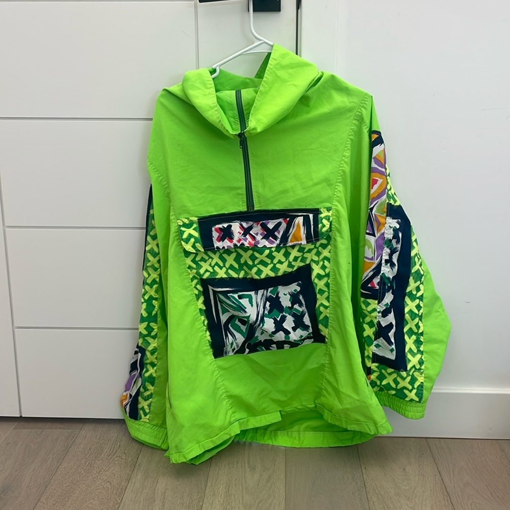 100% Polyester Neon Festival Jumper
Fits like an oversized Large
